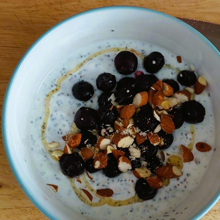 Easy make-ahead overnight oats perfect for perimenopause breakfast - almond vanilla chia recipe with fresh fruit toppings