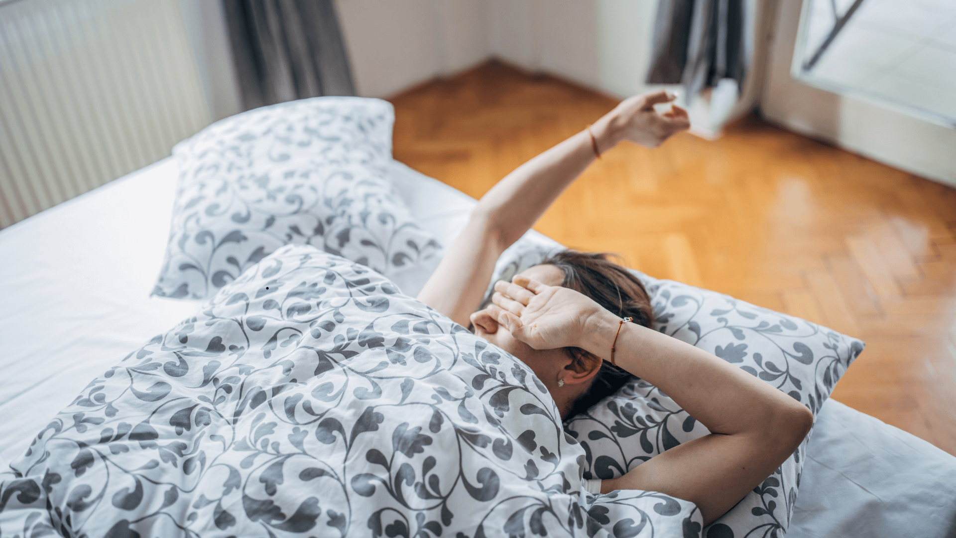 Woman waking up exhausted in the morning from lack of sleep in perimenopause